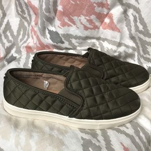 Green slip-on sneakers
